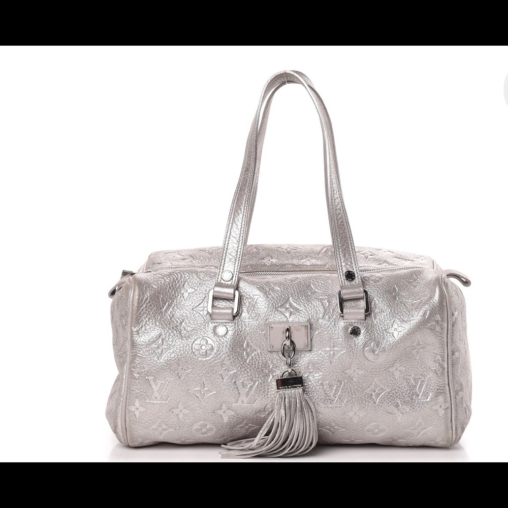 LOUIS VUITTON MONOGRAMED SILVER PURSE